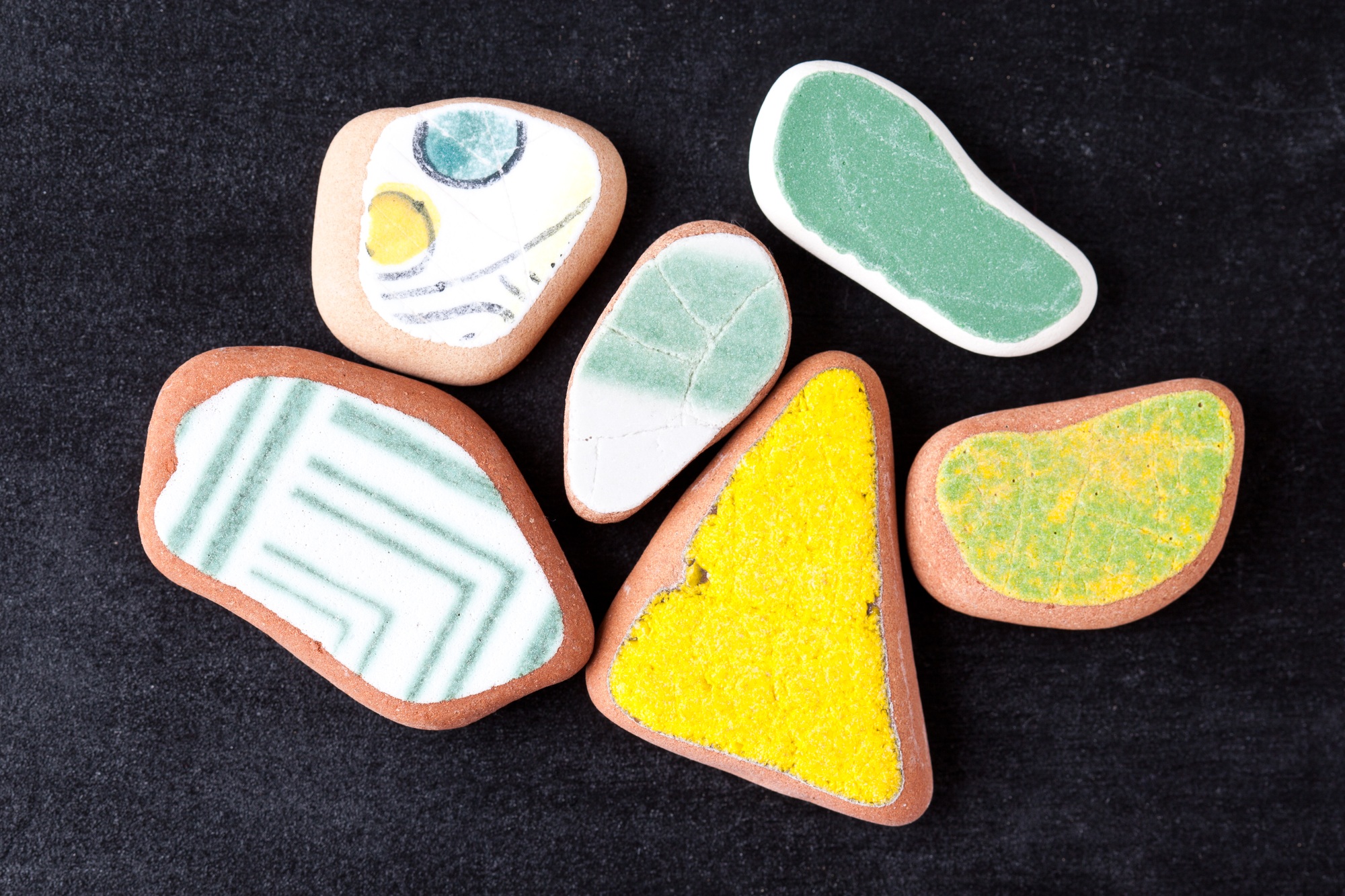 pieces of colorful tiles polished by the sea
